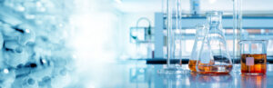 A photo of some chemicals on the right fading away to molecules on the left
