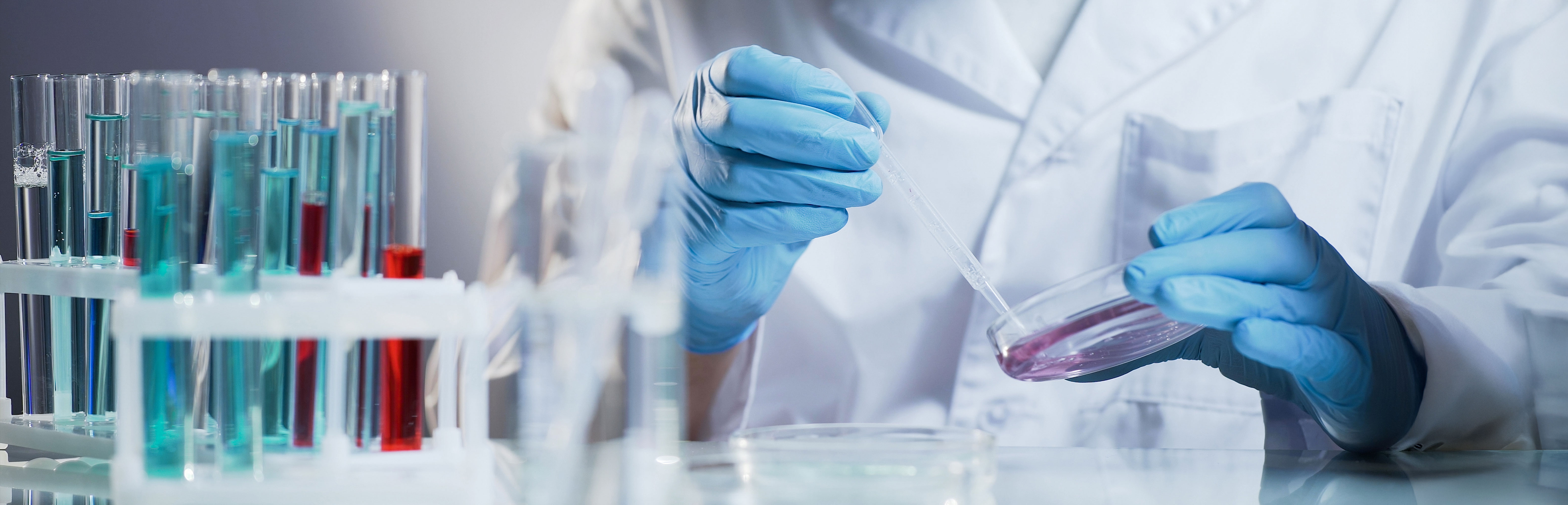 toxicology banner person testing chemicals
